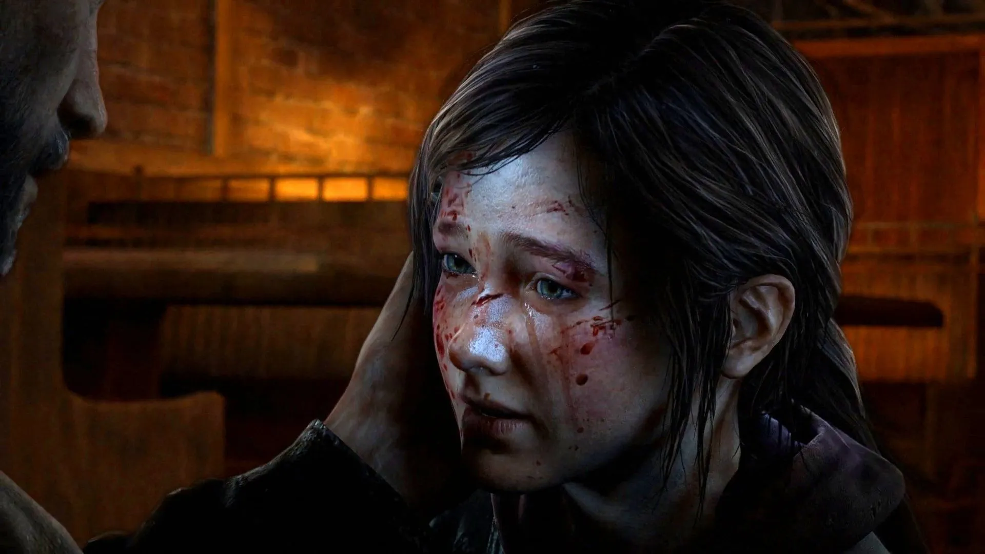 Joel acariciando Ellie manchada de sangue após ela matar David.