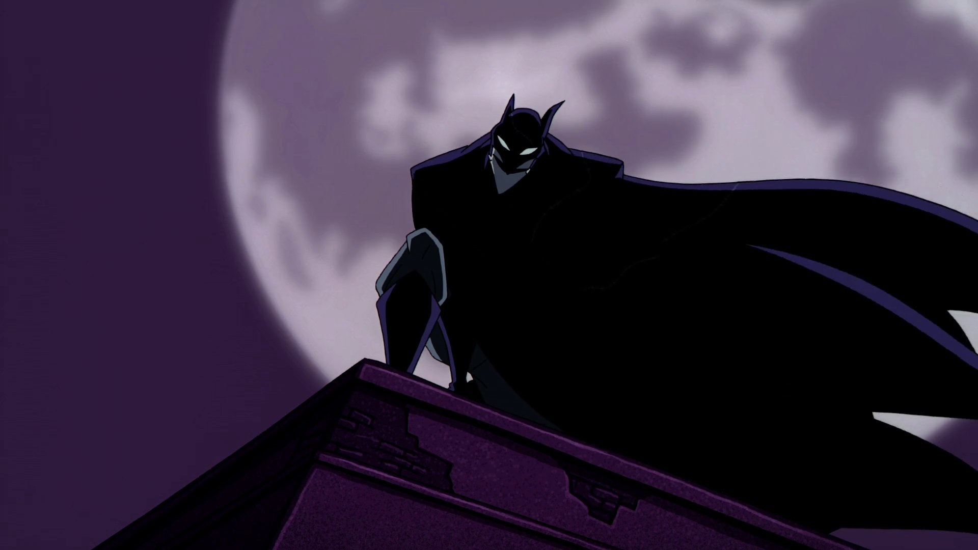  Cena do desenho The Batman mostrando o Coringa fantasiado de Batman, sendo possível reconhecê-lo pela parte da fantasia do rosto que fica exposta, com um grande sorriso na cara. Ele está agachado na beirada de um prédio com uma grande lua atrás de si.